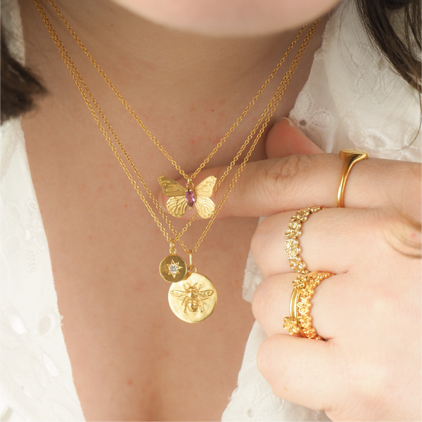 gold bumblebee necklace and gold butterfly necklace