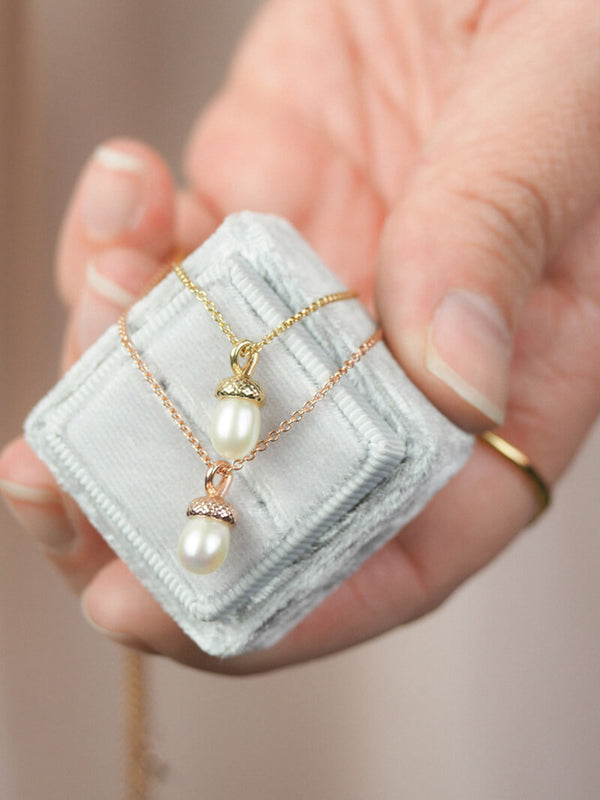 rose and yellow gold tiny pearl acorn pendants