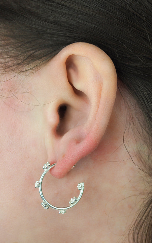 silver blossom flower hoop earrings 