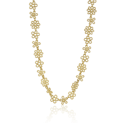 Yellow gold flower doodle necklace on white background