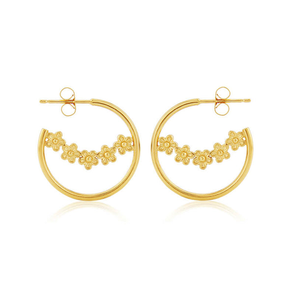 Gold hoops with a bough of small flowers