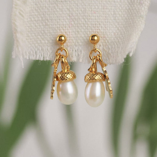 gold pearl acorn drop earrings with a tiny oak leaf