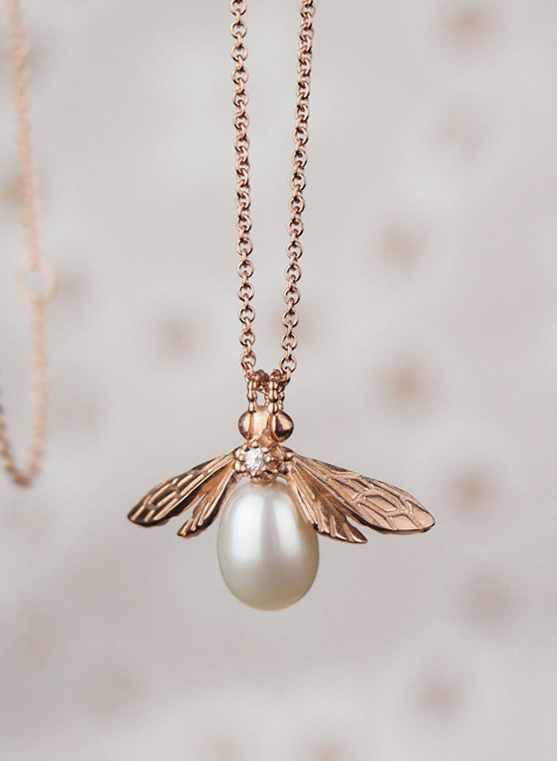 rose gold bumblebee necklace with white drop pearl body