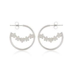 silver hoop earrings with a bough of small flowers