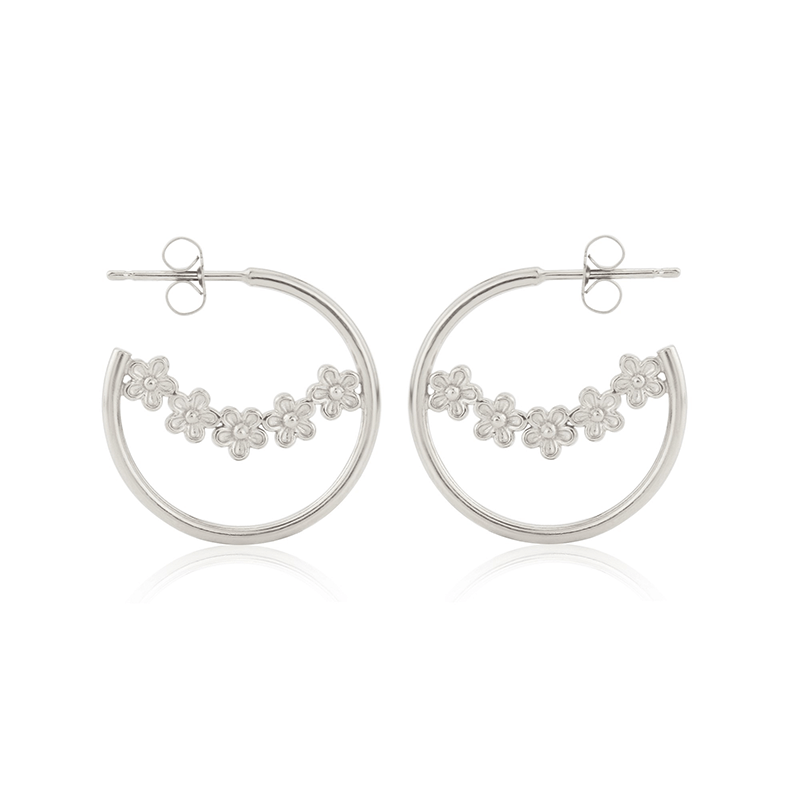 silver hoop earrings with a bough of small flowers