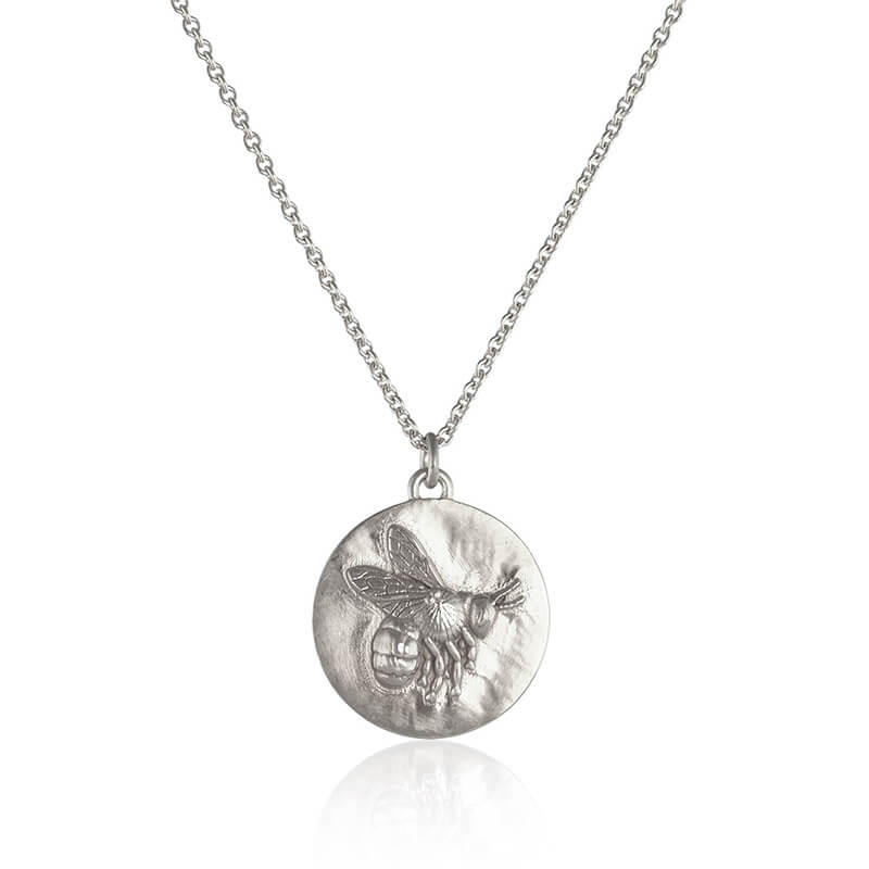 sterling silver coin style pendant with bee motif