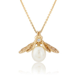 gold pearl bee necklace with white sapphire gemstone